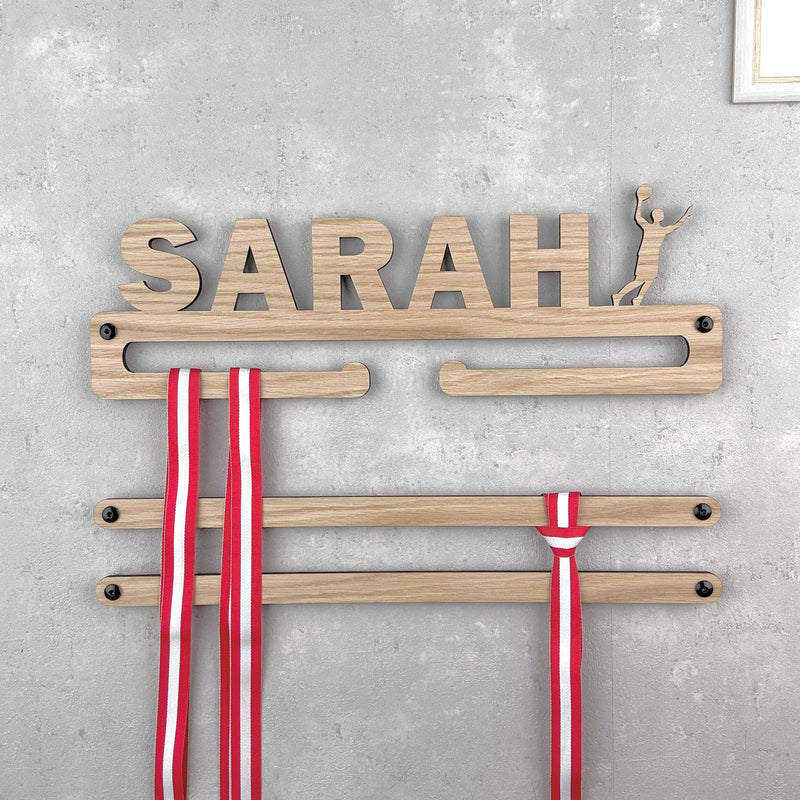 Medal hanger with ball player and own name