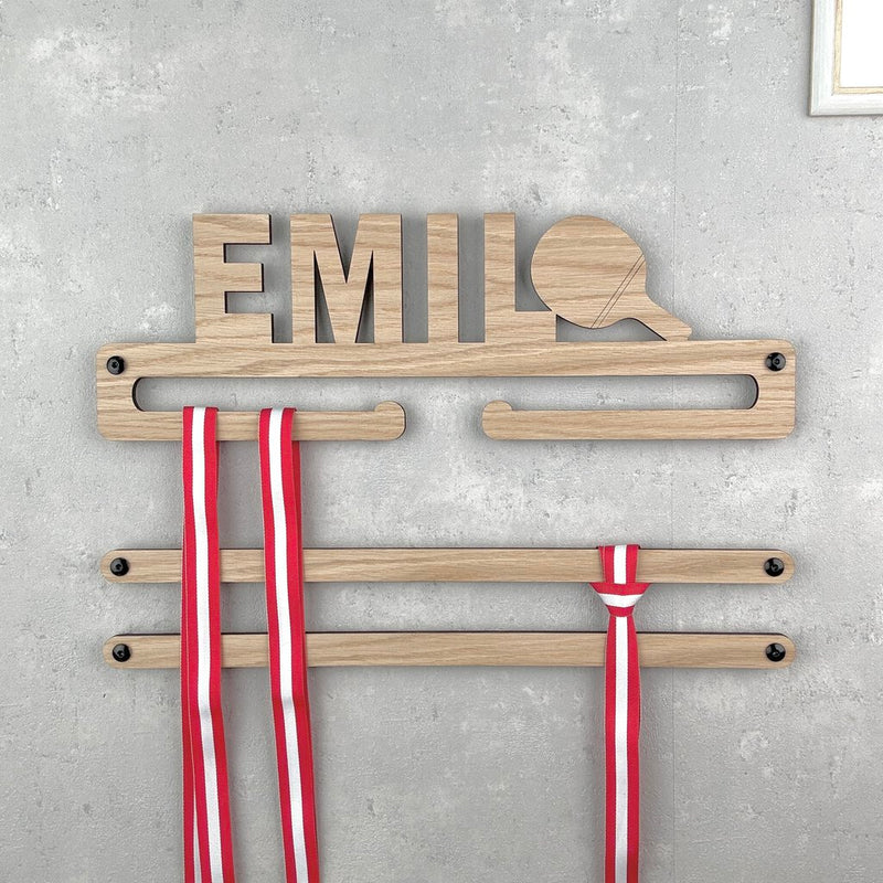 Medal hanger with table tennis bat and own name