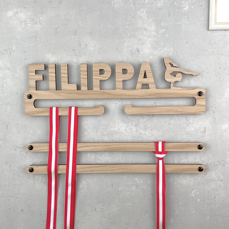 Medal holder with gymnast and own name