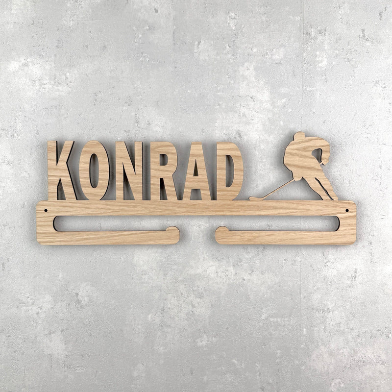Medal hanger with hockey player and own name