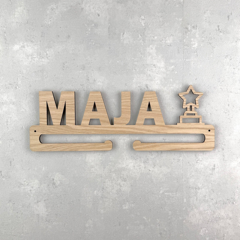 Medal hanger with star trophy and own name
